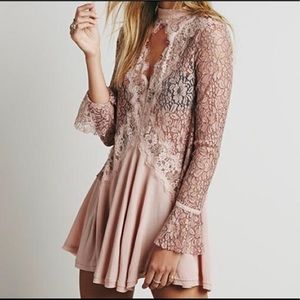 Free people secrets origins pieced lace tunic.